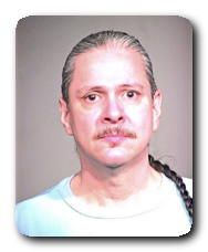 Inmate JOHN ENRIQUEZ