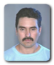 Inmate JORGE MADRID OLIVAS