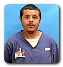 Inmate JUAN FLORES